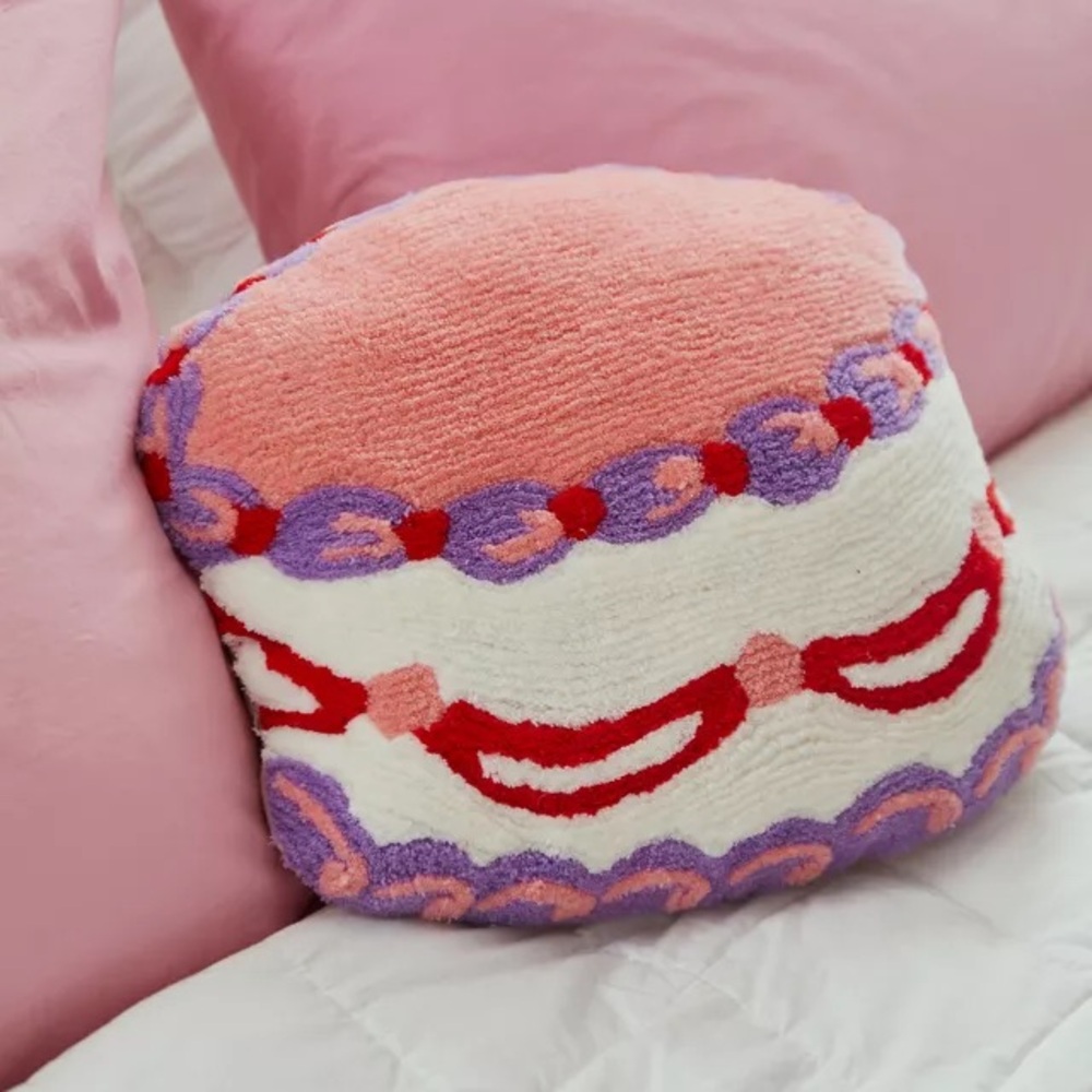 Urban Outfitters cake tufted decorative pillow